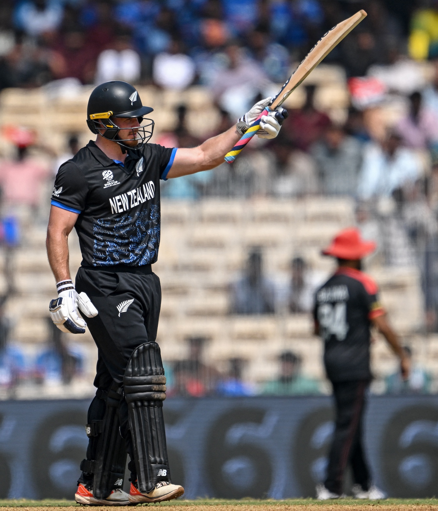 Samra's record 110 in vain as Phillips and Ravindra put New Zealand in Super Eights